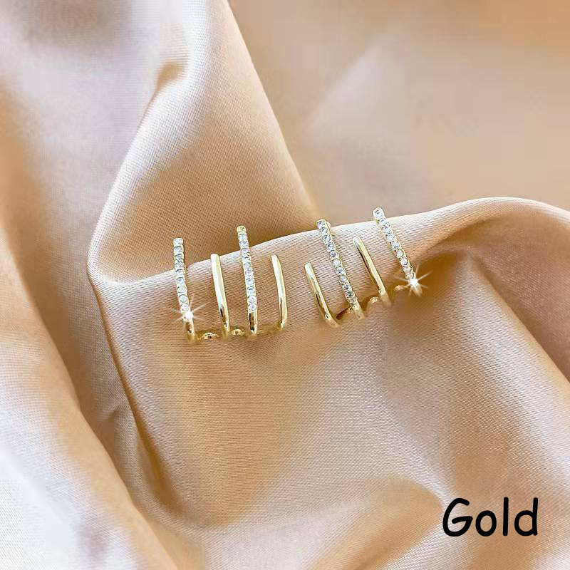 🚀 NUEVO LANZAMIENTO | Aros Cuatro Puntas - Bañados en Oro 18K + ENVÍO GRATIS ✨